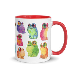 A colorful ceramic Frog Frenzy Mug adorned with whimsical illustrations of vibrant frogs in various poses, inspired by Chris Ryniak watercolor frog paintings, from Bindlewood Shop.