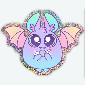 A durable holographic Glitter Bat Sticker (Pastel) from Bindlewood Shop with rainbow sparkles on the edges.