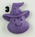 A purple, smiling blob-shaped Halloween Magnet from Bindlewood Shop, hand-sculpted with a pointed witch hat and buckle. Bold black number 3 is displayed to the left of the figure.