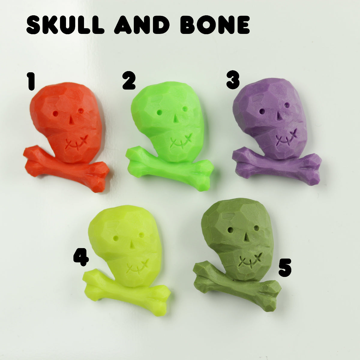 Five colorful skull and bone-shaped objects on a white background with labels.