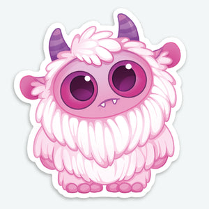 The Pink Yeti Sticker (3-inch) from Bindlewood Shop features a cute cartoon pink monster with big purple eyes, fluffy fur, small horns, and tiny fangs—an adorable addition to your collection!.