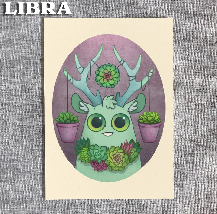 Zodiac Prints by Amanda Louise Spayd from Bindlewood Shop: A whimsical green deer with succulent-adorned antlers on a purple oval backdrop, "LIBRA" in the top left—perfect as a fine art print for astrology lovers.