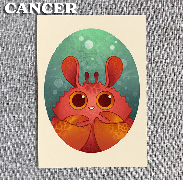 Zodiac Prints by Amanda Louise Spayd from Bindlewood Shop feature a cute cartoon red crab with big eyes and orange claws on an oval with green-blue bubbles. The word "Cancer" appears in bold white at the top left.