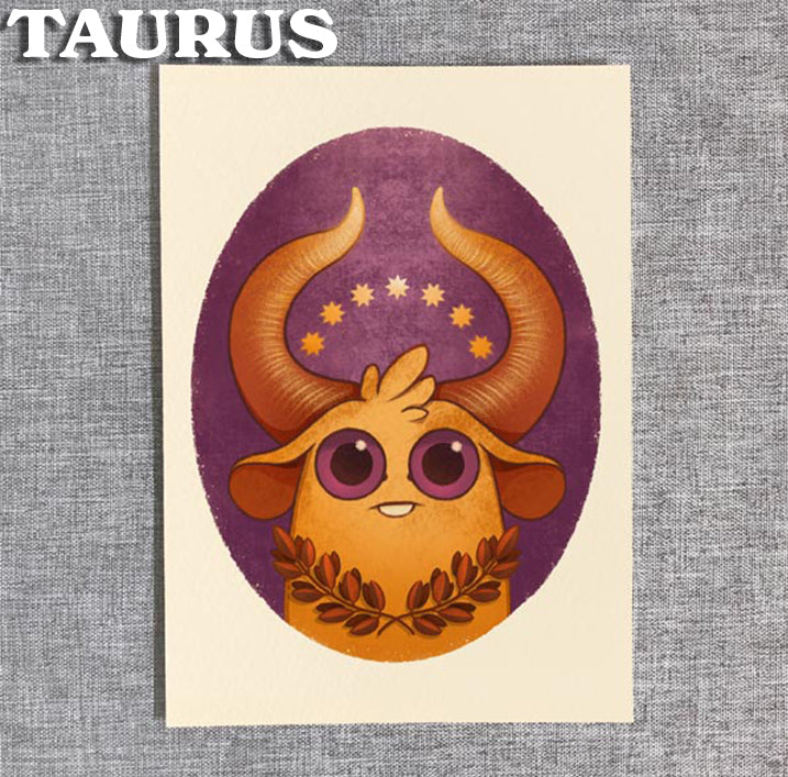 This Bindlewood Shop Zodiac Print by Amanda Louise Spayd features a cute cartoon bull with large horns, purple eyes, and a laurel wreath on an oval purple background. Five yellow stars and "TAURUS" in bold white letters complete the artwork.