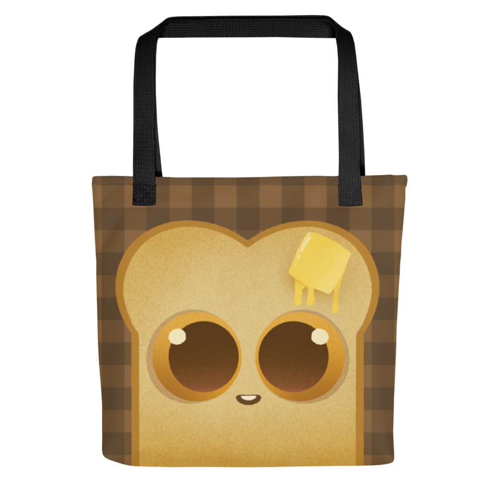 The Toast-Bag Tote from Bindlewood Shop is a durable, quirky bakery bag featuring a cute cartoon toast with big eyes, a smile, and melting butter on brown plaid—perfect for adding fun to your errands.