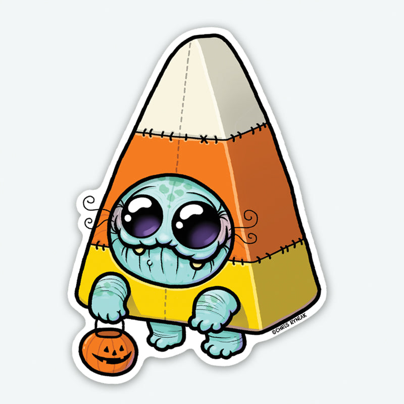 The Candy Corn Suit Sticker from Bindlewood Shop features a whimsical blue, bug-eyed creature in a candy corn costume holding a pumpkin bucket—a Halloween-candy mashup in durable matte vinyl.
