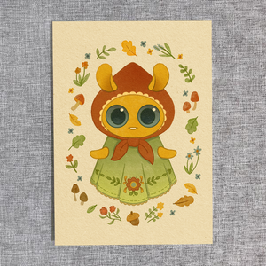 An illustration of a cute, wide-eyed "Garden Sprite" from Thimblestump Hollow dressed in a green outfit with autumn leaves and acorns, whimsically framed by an array of fall foliage and seasonal decor by Amanda L Spayd.