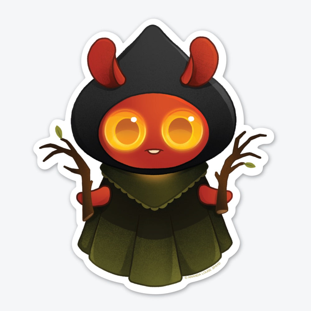 The Flatwoods Monster Sticker by Bindlewood Shop features a cute red cartoon creature in a dark hood, with glowing yellow eyes and tree branches. Inspired by Amanda Louise Spayd, this adorable vinyl sticker is durable and unique.