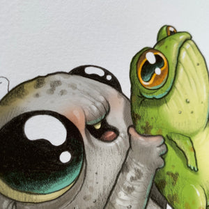 An illustrated image showing a whimsical encounter between a cute, grey creature with large, expressive eyes designed by Amanda Spayd and Chris Ryniak, and a cheerful green frog. The two "Look What I Caught!" Print by Chris Ryniak.