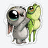 The Look What I Caught Sticker from Bindlewood Shop features a big-eyed gray bunny holding a wide-eyed green frog, both with playful cartoon expressions, on a durable matte vinyl sticker.
