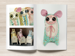 An "Making Friends" book displaying a collection of whimsical, handcrafted plush creatures with large, expressive eyes and unique, colorful designs by Amanda Spayd at Bindlewood Shop.