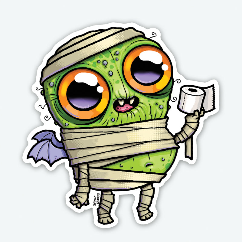 The TP Mummy Sticker from Bindlewood Shop features a cute green monster with orange eyes, wrapped like a mummy and smiling with tiny fangs, holding toilet paper. This playful character is printed on a durable vinyl sticker with a matte finish.