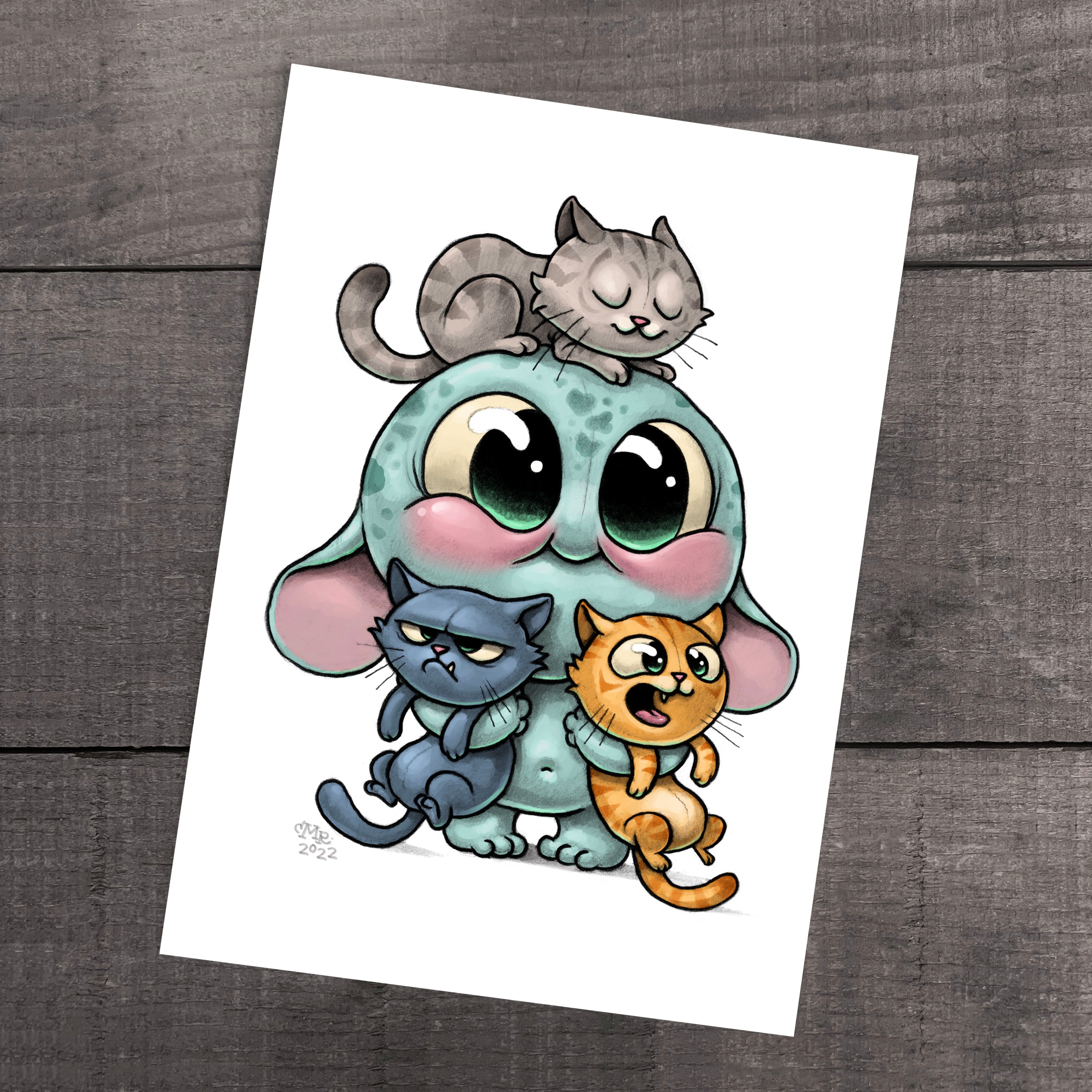 Illustrated image of a cartoonish elephant with big eyes in the signature Chris Ryniak style. A gray cat is asleep on its head, while happy blue and orange cats sit beside it. This fine art piece, titled "All the Cats" Print by Chris Ryniak, is presented on a wooden background and captured on archival paper for enduring elegance.