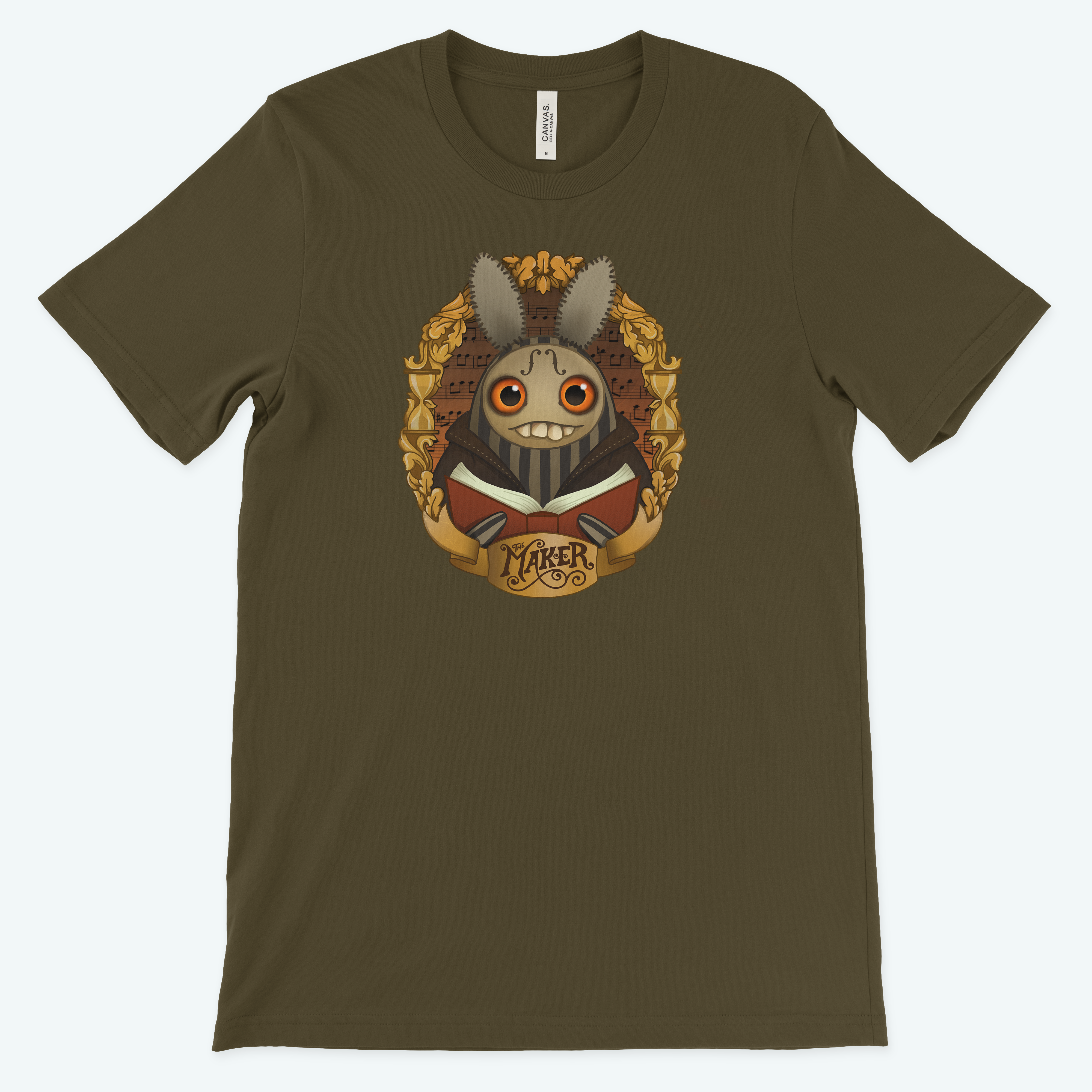 Explore "The Maker" Tee by Bindlewood Shop, an olive green, gender-neutral T-shirt featuring Amanda Louise Spayd's charming design of a grinning, bug-eyed rabbit in a suit with ornate gold detailing and "Maker" inscribed elegantly—ideal for fans of whimsical art.