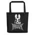The "Black Metal Pipsqueak Tote" by Bindlewood Shop features a creepy white bunny with dark eyes and a distorted smile on black cotton denim. "Pipsqueak" is written below in a jagged, thorny font, and sturdy black handles enhance its dark aesthetic.