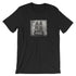 The Pipsqueak Mugshot Tee by Bindlewood Shop features a black-and-white bunny mugshot with a "Police Dept 315154" sign, offering a stylish, vintage vibe and gender-neutral fit for all.