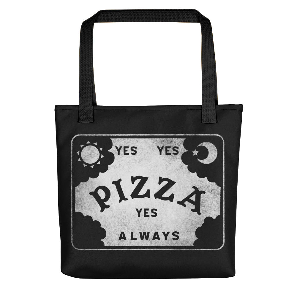 The Pizza Conjuring Board Tote by Bindlewood Shop is a trendy bag featuring Ouija-inspired art, “YES YES PIZZA YES ALWAYS,” sun and moon corners, and cloud edges—perfect for carrying your essentials.