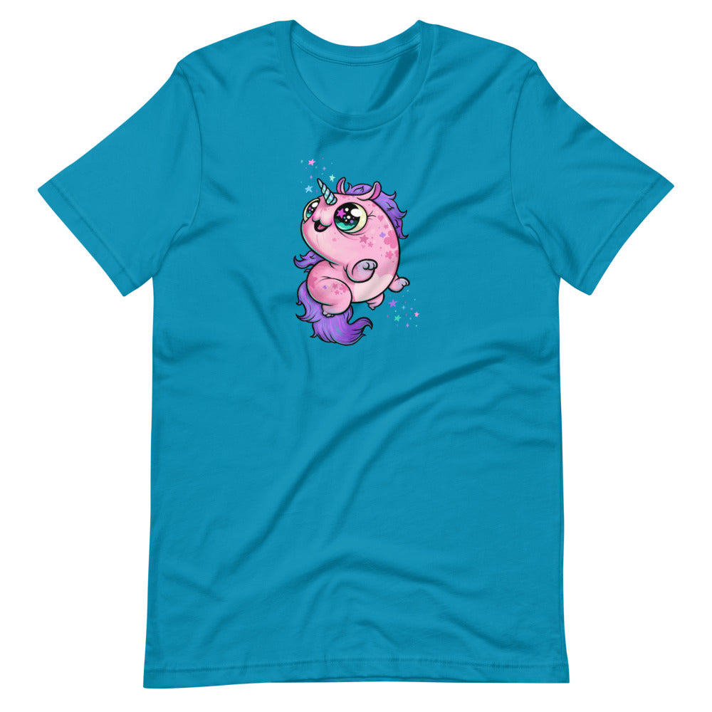 A turquoise t-shirt featuring a whimsical illustration of Chris Ryniak's Flooficorn, a chubby pink unicorn with big eyes, purple mane and tail, and stars around it. The unicorn, standing upright, has spots on its body and appears to be enveloped in bright sparkles. The Bindlewood Shop Floofy Unicorn Magic Tee offers a gender-neutral fit.