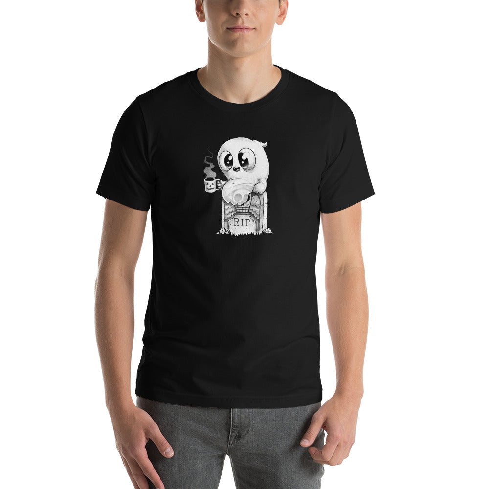 A person is wearing the Good Mourning Tee by Bindlewood Shop, a cozy black T-shirt that showcases a cartoonish ghost character holding a steaming coffee cup and leaning on a tombstone marked "RIP." The shirt offers a gender-neutral fit and evokes a vintage look. The person stands against a plain white background with their hands resting by their sides.