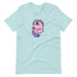 A cozy, light-blue Floofy Unicorn Magic Tee from Bindlewood Shop featuring Chris Ryniak's Flooficorn—a cartoon-style, chubby pink unicorn with purple hair. The unicorn has big, shiny eyes and is surrounded by small blue stars. The gender-neutral fit ensures a whimsical and playful design for everyone.