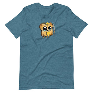 A blue Heather colors t-shirt featuring the Toastboy Tee from Bindlewood Shop, that is a combination of a slice of bread and an owl, holding a butter knife and wearing glasses.