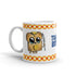 The Bindlewood Shop's Toastboy Mug showcases a delightful illustration of an adorable, anthropomorphized toast slice with butter and syrup, wielding a knife. The toast character is designed with big, shiny eyes and a cheerful expression. This glossy white ceramic mug, adorned with a patterned border and the words "Toast Boss" beside the character, is both dishwasher and microwave safe.