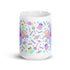 Introducing the Pastel Candy Bat Mug from Bindlewood Shop: a white ceramic mug adorned with vibrant pastel illustrations of adorable bats with wings, playful ghosts, and an assortment of candies such as lollipops and wrapped sweets. The backdrop is embellished with tiny stars in coordinating pastel hues. This mug is both dishwasher safe and microwave safe for your convenience.